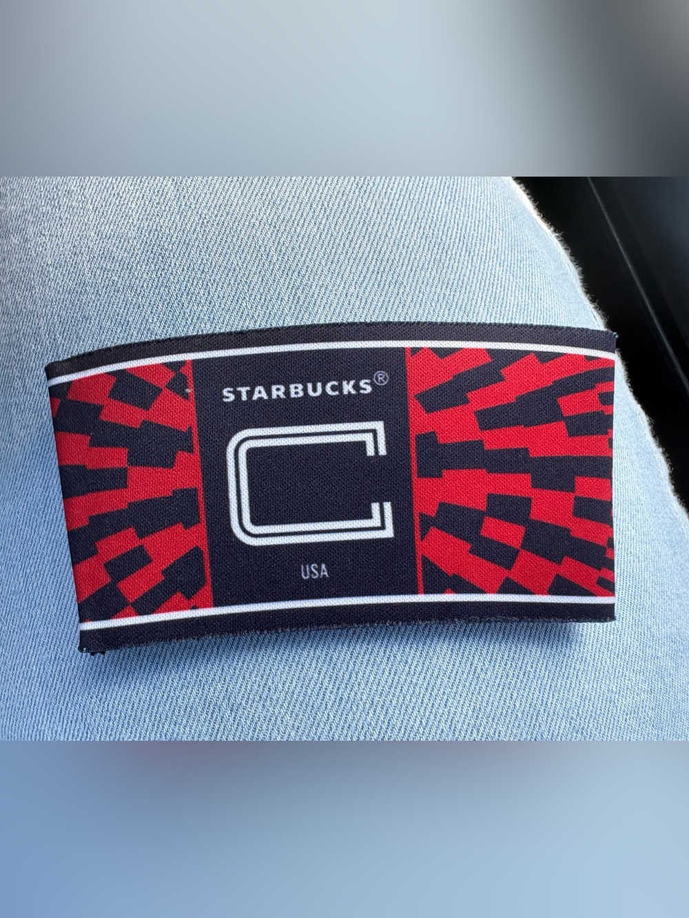 Starbucks Red and Black Patterned Logo Cup Sleeve